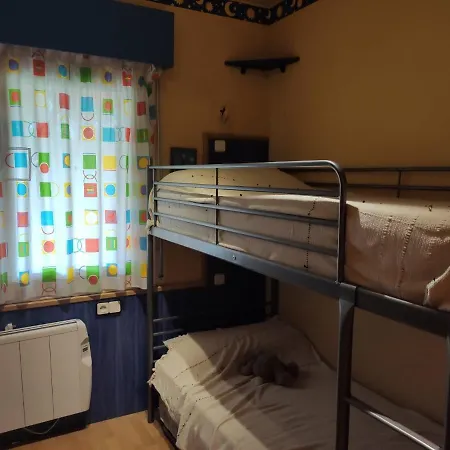 Апартаменты Apartamento A Pie De Playa Комарруга