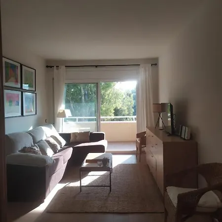 Апартаменты Apartamento A Pie De Playa Комарруга